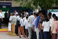 (240526) -- PHNOM PENH, May 26, 2024 (Xinhua) -- Voters line up to vote in local council elections in Phnom Penh, Cambodia, on May 26, 2024. The municipal, provincial, town and district council elections for the fourth term kicked off in Cambodia on Sunday, with five political parties taking part in the race, a National Election Committee (NEC) spokesperson said. (Photo by Sovannara/Xinhua