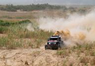 (240526) -- HOTAN, May 26, 2024 (Xinhua) -- Driver Wang Qingxi of China and his pilot Guo Feng of China compete during the fifth stage at the 2024 Taklimakan Rally, in China