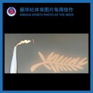 (240528) -- BEIJING, May 28, 2024 (Xinhua) -- XINHUA SPORTS PHOTO OF THE WEEK (from May 20 to May 26, 2024) TRANSMITTED on May 28, 2024. The Paris 2024 Olympic torch is seen at the 77th edition of the Cannes Film Festival in Cannes, southern France, on May 21, 2024, as part of the Olympics torch relay. (Xinhua/Gao Jing