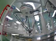 (240528) -- SHENYANG, May 28, 2024 (Xinhua) -- A robot works at a workshop of Shenyang Sinqi Pharmaceutical Co., Ltd. in Shenyang, northeast China