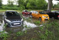 (240528) -- KARLOVAC (CROATIA), May 28, 2024 (Xinhua) -- A parking lot is flooded with water caused by storm and heavy rain in Karlovac, Croatia, on May 28, 2024. (Kristina Stedul Fabac/PIXSELL via Xinhua