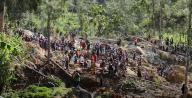 (240529) -- ENGA, May 29, 2024 (Xinhua) -- This screenshot captured from a video shows people searching the site of a landslide in Enga Province, Papua New Guinea, May 27, 2024. It is "highly unlikely" to find any more survivors from the massive landslide in Papua New Guinea (PNG)