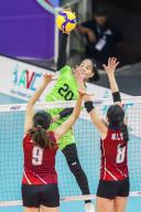 (240529) -- MANILA, May 29, 2024 (Xinhua) -- Junaida Santi of Indonesia (top) spikes the ball during the 7th-8th final match in the Asian Women