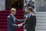 (240530) -- ATHENS, May 30, 2024 (Xinhua) -- Greek Prime Minister Kyriakos Mitsotakis (L) welcomes Qatari Emir Sheikh Tamim bin Hamad Al Thani, who is on an official visit to Athens, at the Prime Minister