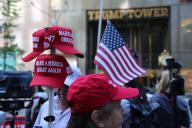 (240531) -- NEW YORK, May 31, 2024 (Xinhua) -- People wearing caps in support of former U.S. President Donald Trump are seen in front of Trump Tower in New York, the United States, on May 31, 2024. Former U.S. President Donald Trump Friday said he will appeal his conviction on all counts in the hush money trial in New York City. (Xinhua/Liu Yanan