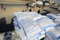 (240531) -- GAZA, May 31, 2024 (Xinhua) -- Humanitarian aid arrives at a warehouse of the United Nations Relief and Works Agency for Palestine Refugees in the Near East (UNRWA) in the southern Gaza Strip city of Khan Younis, on May 31, 2024. The Hamas-run media office in Gaza on Friday warned of an unprecedented humanitarian disaster in the enclave due to the closure of land crossings. (Photo by Rizek Abdeljawad/Xinhua