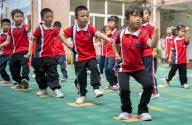 (240601) -- BEIJING, June 1, 2024 (Xinhua) -- Children practice martial arts at a kindergarten in Jianghan District of Wuhan, central China