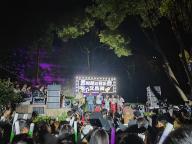 (240601) -- GUIYANG, June 1, 2024 (Xinhua) -- This photo taken on May 24, 2024 shows a roadside concert at the Wenchang Pavilion in Guiyang, southwest China
