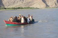 (240601) -- NANGARHAR, June 1, 2024 (Xinhua) -- People search for missing people in a river following a boat accident in Momand Dara district, east Afghanistan