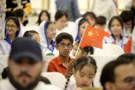 (240602) -- ISLAMABAD, June 2, 2024 (Xinhua) -- A Pakistani boy waves a Chinese national flag during a celebration of the International Children