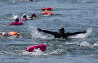 (240602) -- SEOUL, June 2, 2024 (Xinhua) -- Participants swim across the Hangang River during the 1st Sium Sium Hangang Triathlon Festival in Seoul, South Korea, June 2, 2024. (Photo by Jun Hyosang/Xinhua