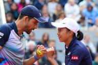 (240603) -- PARIS, June 3, 2024 (Xinhua) -- Zhang Shuai (R)/Marcelo Arevalo react during the mixed doubles first round match between Zhang Shuai (China)/Marcelo Arevalo (El Salvador) and Bethanie Mattek-Sands/Austin Krajicek of the United States at the French Open tennis tournament at Roland Garros in Paris, France, June 2, 2024. (Xinhua/Meng Dingbo