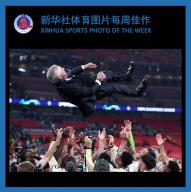 (240603) -- BEIJING, June 3, 2024 (Xinhua) -- XINHUA SPORTS PHOTO OF THE WEEK (from May 27 to June 2, 2024) TRANSMITTED on June 3, 2024. Players of Real Madrid throw their coach Carlo Ancelotti into the air after winning the UEFA Champions League final match between Real Madrid and Borussia Dortmund in London, Britain, June 1, 2024. (Str/Xinhua