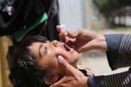 (240603) -- KABUL, June 3, 2024 (Xinhua) -- A child receives a dose of polio vaccine in Kabul, the capital of Afghanistan, June 3, 2024. Afghanistan