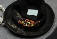 Things left behind at site of crowd crush A hat with a message reading "Happy Halloween," left behind at the site of a crowd crush in Seoul