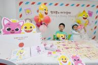 Pinkfong, Baby Shark stamps issued Kids pose for a photo with commemorative stamps featuring globally renowned South Korean characters Pinkfong and Baby Shark at a stamp museum in Seoul on May 2, 2024. The stamps will be available for sale the following day, two days ahead of Children\'s Day.(Yonhap)\/2024-05-02 15:27:50\/ < 1980-2024 YONHAPNEWS AGENCY.