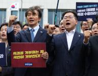 Calling for special counsel probe Cho Kuk (L), leader of the Rebuilding Korea Party, and Park Chan-dae, floor leader of the Democratic Party, attend a press conference demanding President Yoon Suk Yeol accept a special counsel probe into a Marine